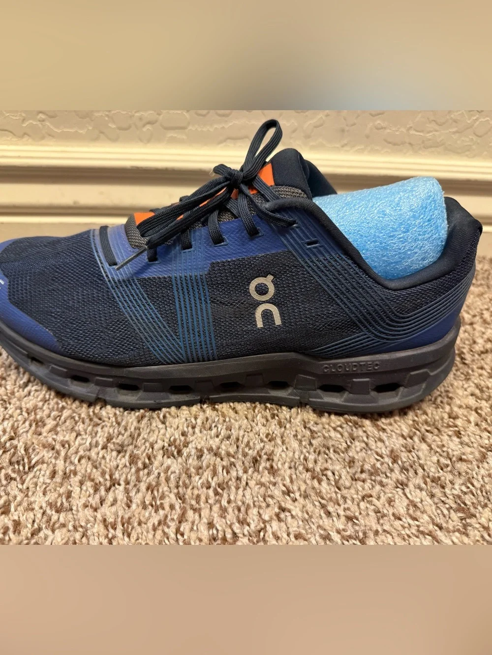 On Running Men’s Navy and Black Cloudtec Trainer with Orange Accents